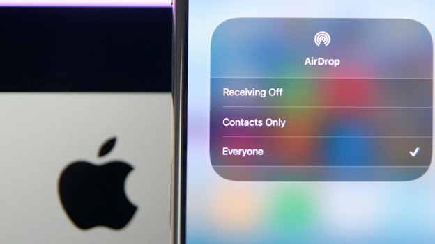 choose everyone or contacts only in AirDrop settings of iPad
